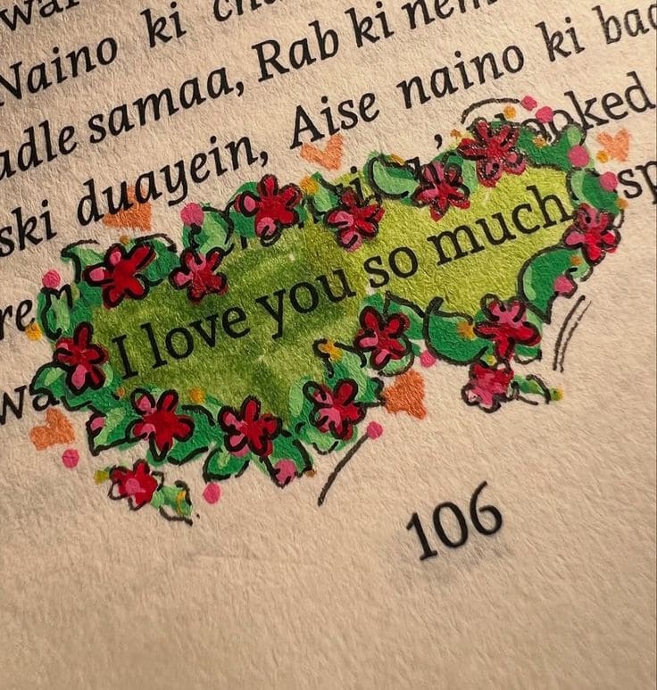 foto de um livro escrito i love you so much com rosas ao redor